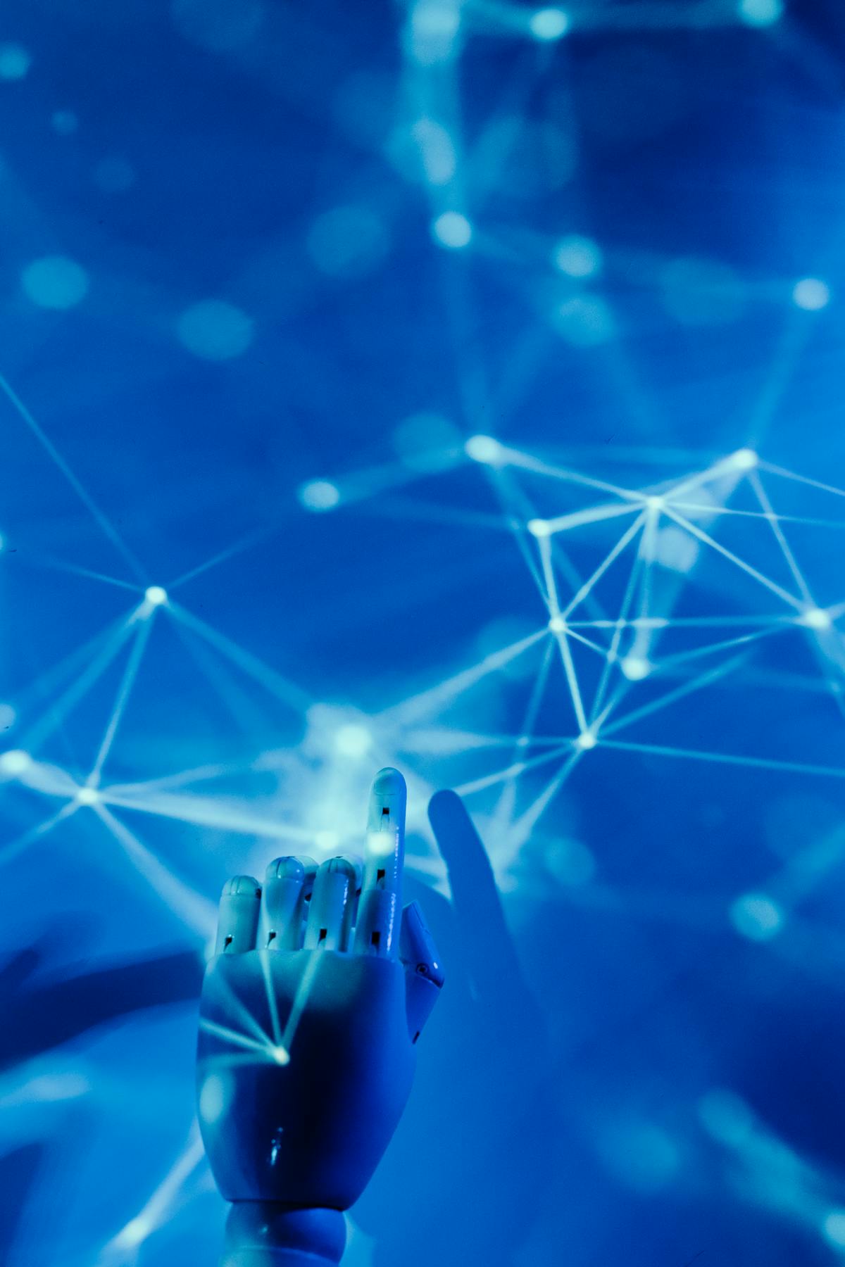 Main robotique touchant un réseau numérique, intelligence artificielle